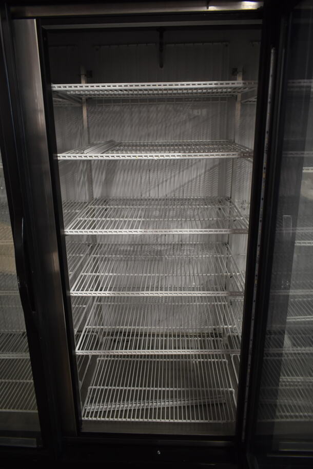 2016 True GDM-72F-HC-TSL01 ENERGY STAR Metal Commercial 3 Door Reach In Freezer Merchandiser w/ Poly Coated Racks on Commercial Casters. 115/208-230 Volts, 1 Phase. - Image 7 of 9