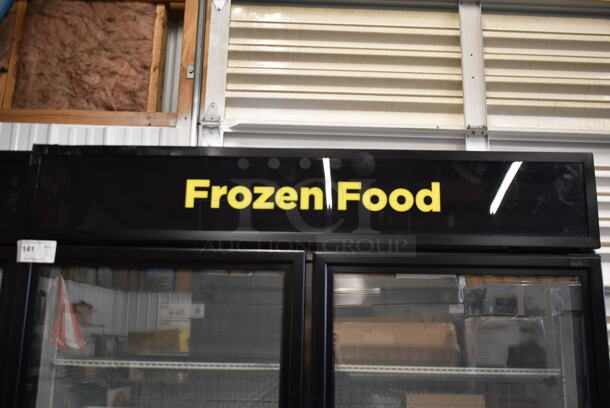 2017 True  GDM-49F-HC-TSL01 ENERGY STAR Metal Commercial 2 Door Reach In Freezer Merchandiser w/ Poly Coated Racks on Commercial Casters. 115/208-230 Volts, 1 Phase.
 - Image 2 of 8