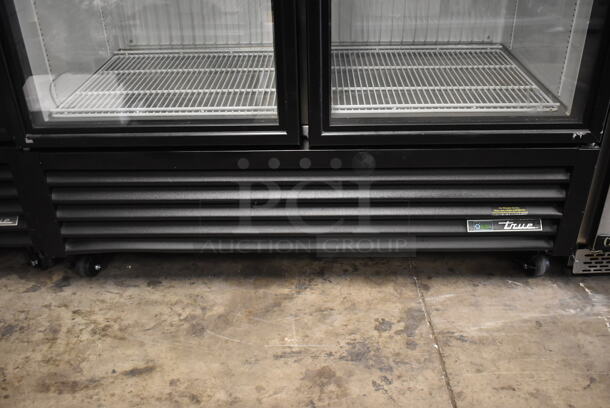 2017 True  GDM-49F-HC-TSL01 ENERGY STAR Metal Commercial 2 Door Reach In Freezer Merchandiser w/ Poly Coated Racks on Commercial Casters. 115/208-230 Volts, 1 Phase.
 - Image 4 of 8