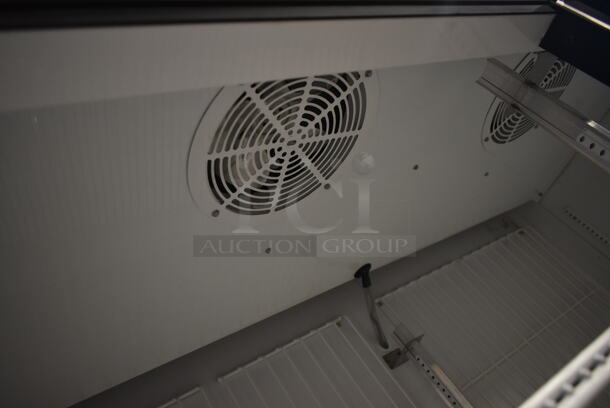 2017 True  GDM-49F-HC-TSL01 ENERGY STAR Metal Commercial 2 Door Reach In Freezer Merchandiser w/ Poly Coated Racks on Commercial Casters. 115/208-230 Volts, 1 Phase.
 - Image 7 of 8