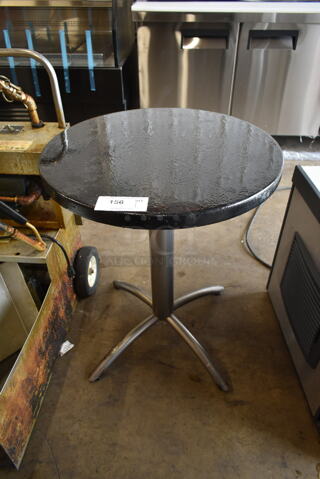 Black Round Dining Height Table on Metal Base.
