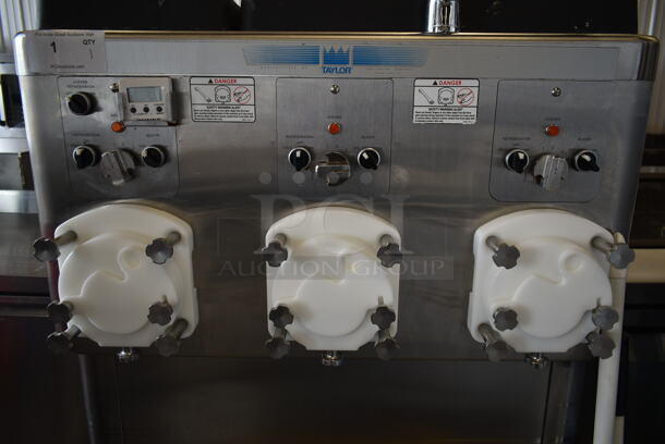 2018 Taylor C043-33 Stainless Steel Commercial Floor Style Water Cooled 3 Flavor Continuous Dispensing Frozen Custard Machine / Batch Freezer on Commercial Casters. Comes w/ 3 Taylor RC35N-33 Compressors. 115/208/230 Volts, 3 Phase. - Image 3 of 12