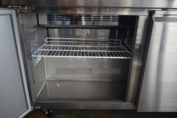 BRAND NEW SCRATCH AND DENT! 2023 Avantco 178SSPT6010 Stainless Steel Commercial Sandwich Salad Prep Table Bain Marie Mega Top on Commercial Casters. 115 Volts, 1 Phase. Tested and Working! - Image 6 of 10