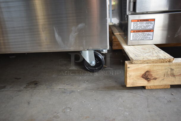 BRAND NEW SCRATCH AND DENT! 2023 Avantco 178SSPT6010 Stainless Steel Commercial Sandwich Salad Prep Table Bain Marie Mega Top on Commercial Casters. 115 Volts, 1 Phase. Tested and Working! - Image 9 of 10