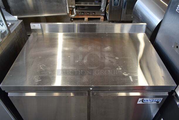 Avantco 178SSWT48FHC Stainless Steel  Commercial 2 Door Work Top Freezer w/ Back Splash on Commercial Casters. 115 Volts, 1 Phase. Tested and Working! - Image 2 of 7