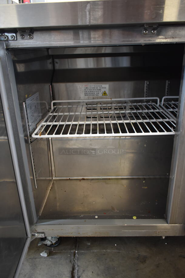 Avantco 178SSWT48FHC Stainless Steel  Commercial 2 Door Work Top Freezer w/ Back Splash on Commercial Casters. 115 Volts, 1 Phase. Tested and Working! - Image 4 of 7