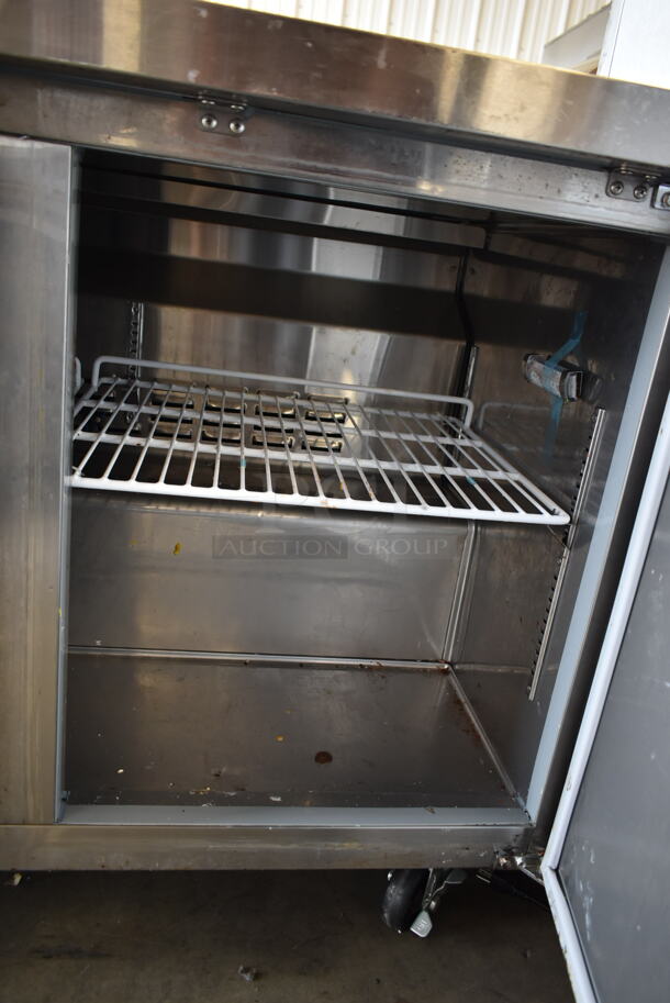 Avantco 178SSWT48FHC Stainless Steel  Commercial 2 Door Work Top Freezer w/ Back Splash on Commercial Casters. 115 Volts, 1 Phase. Tested and Working! - Image 6 of 7