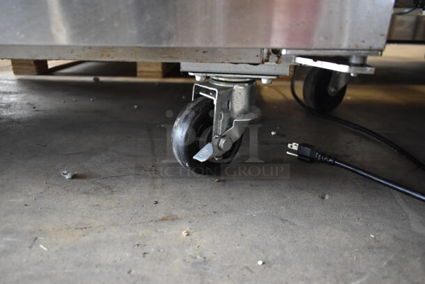 Avantco 178SSWT48FHC Stainless Steel  Commercial 2 Door Work Top Freezer w/ Back Splash on Commercial Casters. 115 Volts, 1 Phase. Tested and Working! - Image 7 of 7