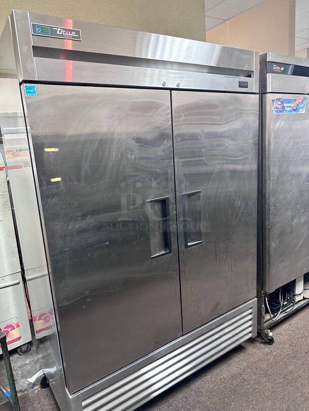 New True T-49F-HC 54 inch Two Section Reach In Freezer, (2) Solid Doors, 115v  - Image 1 of 7