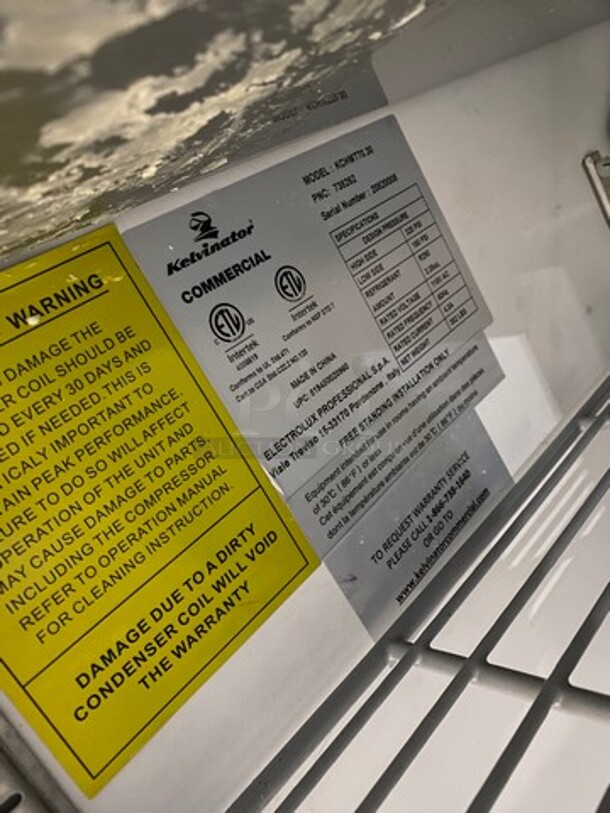 LATE MODEL! Kelvinator Commercial Refrigerated Sandwich Prep Table! With 3 Door Storage Space Underneath! All Stainless Steel! On Casters! Model: KCHMT7030 SN: 20820008 115V 1Phase! Working When Removed!  - Image 7 of 9