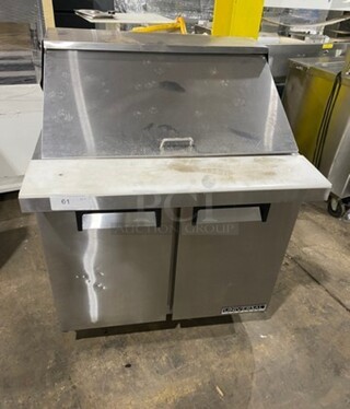Universal Coolers Commercial Refrigerated Sandwich Prep Table! With 2 Door Storage Space Underneath! With Poly Coated Rack! All Stainless Steel! On Casters!