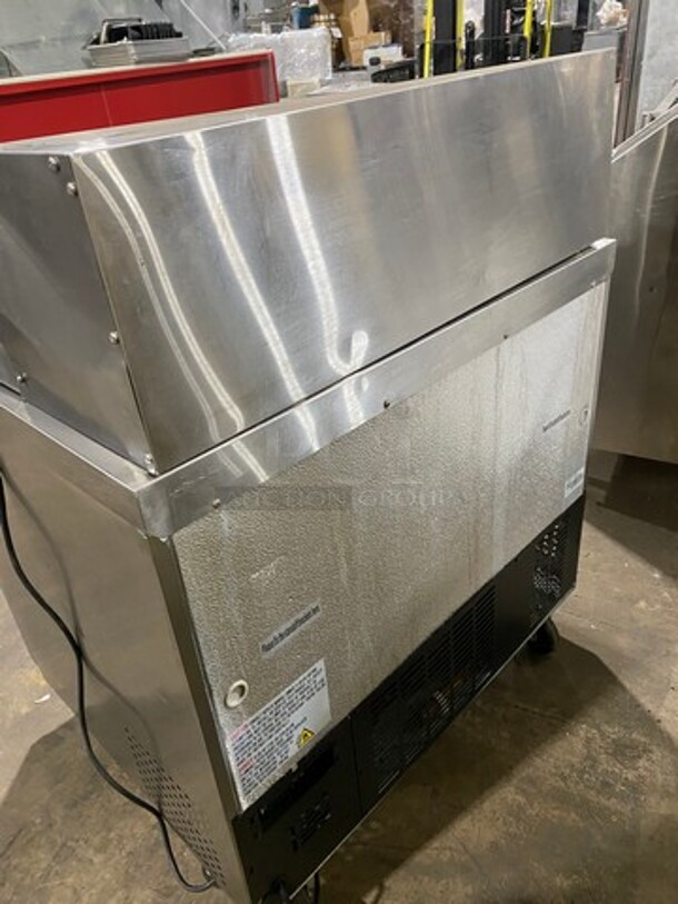 Universal Coolers Commercial Refrigerated Sandwich Prep Table! With 2 Door Storage Space Underneath! With Poly Coated Rack! All Stainless Steel! On Casters! - Image 4 of 9