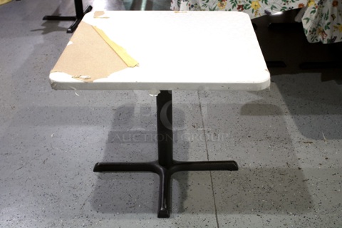 34in x 34in Restaurant Table With Standard Column Base & Flower Pattern Table Cloth.  