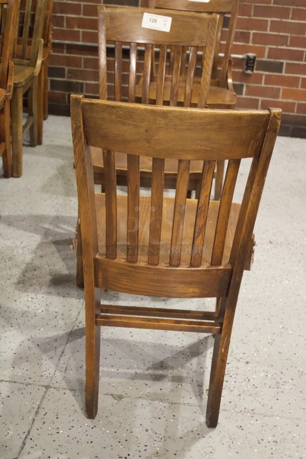 BEAUTIFUL! Set Of 4 Solid Wood Vertical Ladder Back Chairs. 18x13x35  
4x Your Bid.                      
some chairs are darker than others. - Image 4 of 4