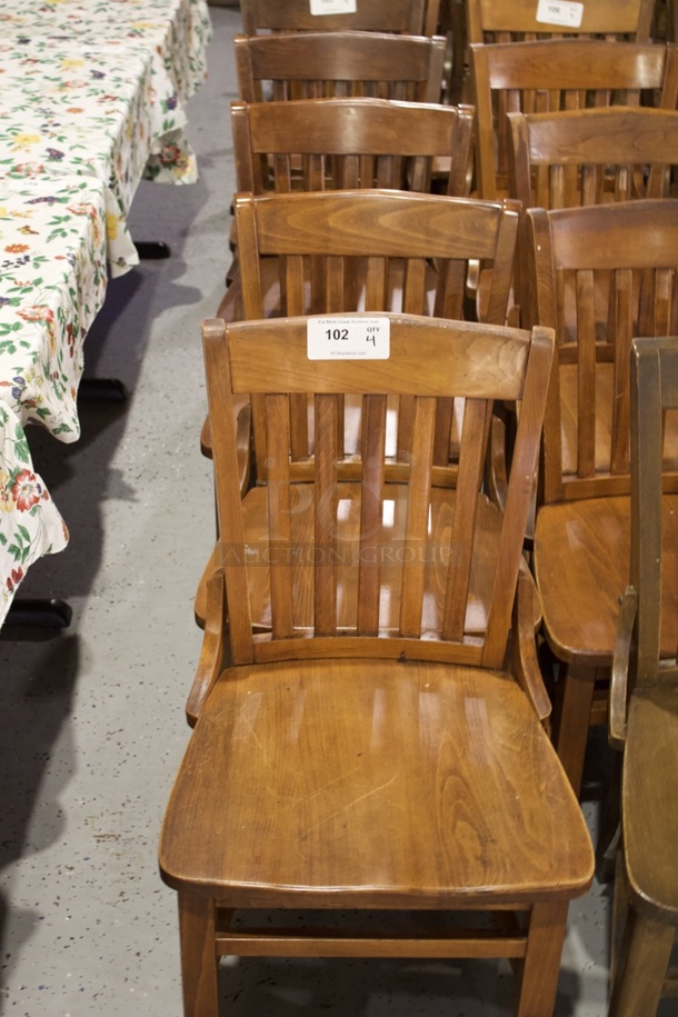 SOLID CRAFTSMANSHIP! Set Of 4 Wooden Ladder Back Chairs. 
18x13x35
some chairs are darker than others.  - Image 1 of 1