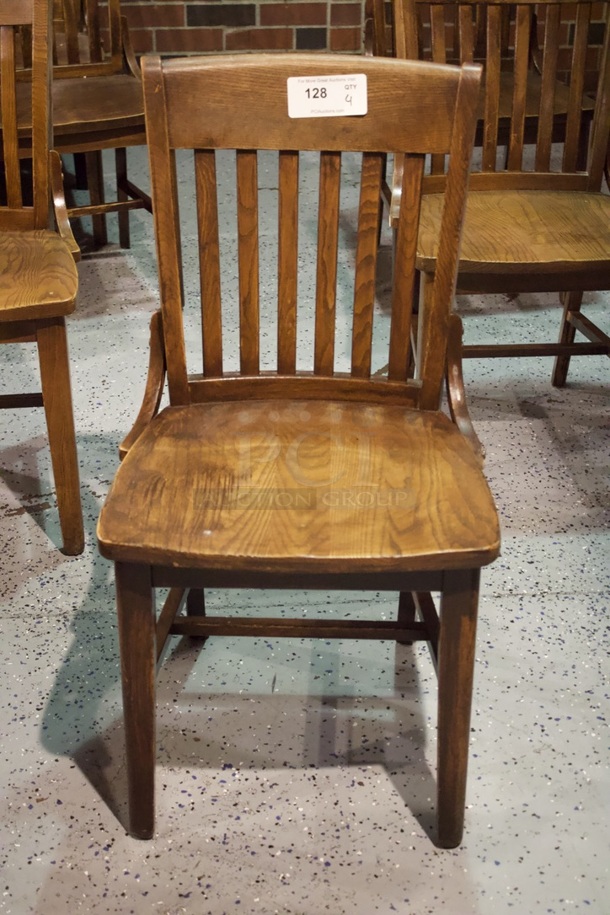 BEAUTIFUL! Set Of 4 Solid Wood Vertical Ladder Back Chairs. 18x13x35  
4x Your Bid.                      
some chairs are darker than others. - Image 2 of 3