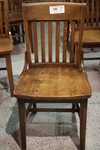 BEAUTIFUL! Set Of 4 Solid Wood Vertical Ladder Back Chairs. 18x13x35  
4x Your Bid.                      
some chairs are darker than others.