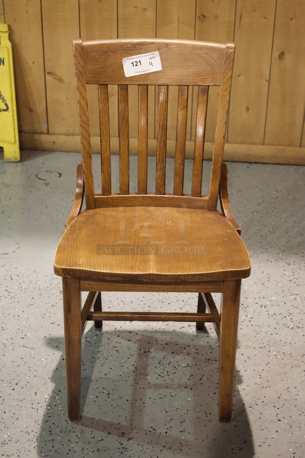 BEAUTIFUL! Set Of 4 Solid Wood Vertical Ladder Back Chairs. 18x13x35  
4x Your Bid.                      
some chairs are darker than others. - Image 1 of 4