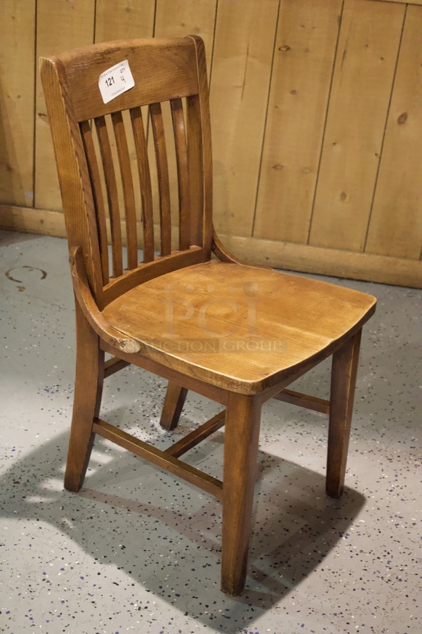 BEAUTIFUL! Set Of 4 Solid Wood Vertical Ladder Back Chairs. 18x13x35  
4x Your Bid.                      
some chairs are darker than others. - Image 2 of 4