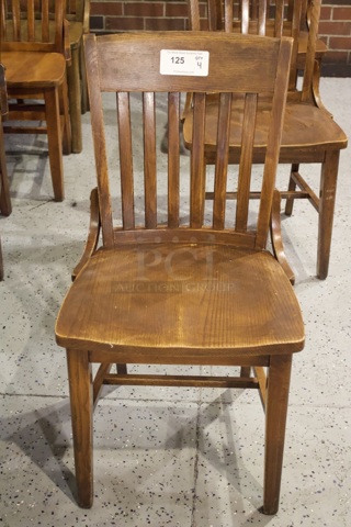 BEAUTIFUL! Set Of 4 Solid Wood Vertical Ladder Back Chairs. 18x13x35  
4x Your Bid.                      
some chairs are darker than others.