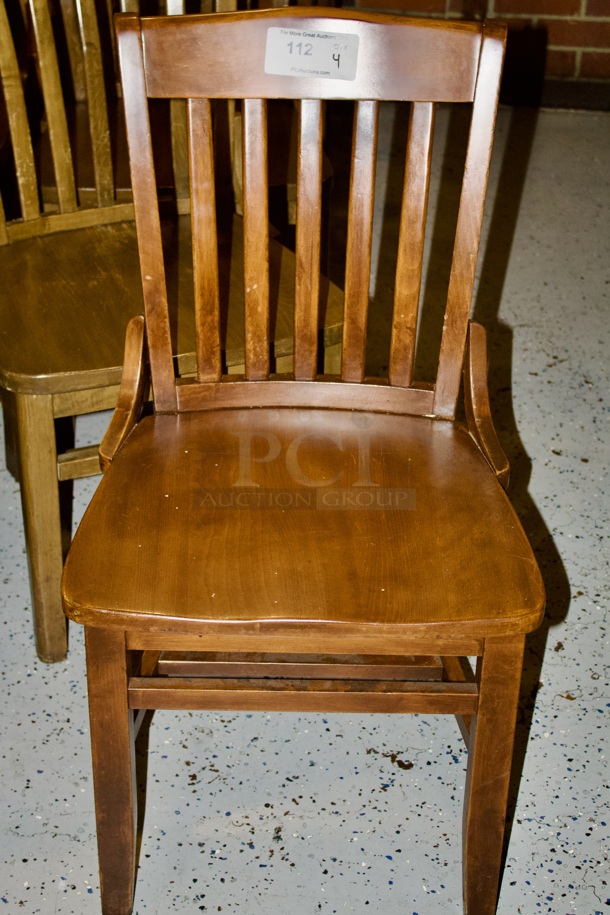 SOLID CRAFTSMANSHIP! Set Of 4 Wooden Ladder Back Chairs. 
18x13x35
some chairs are darker than others.  - Image 1 of 1