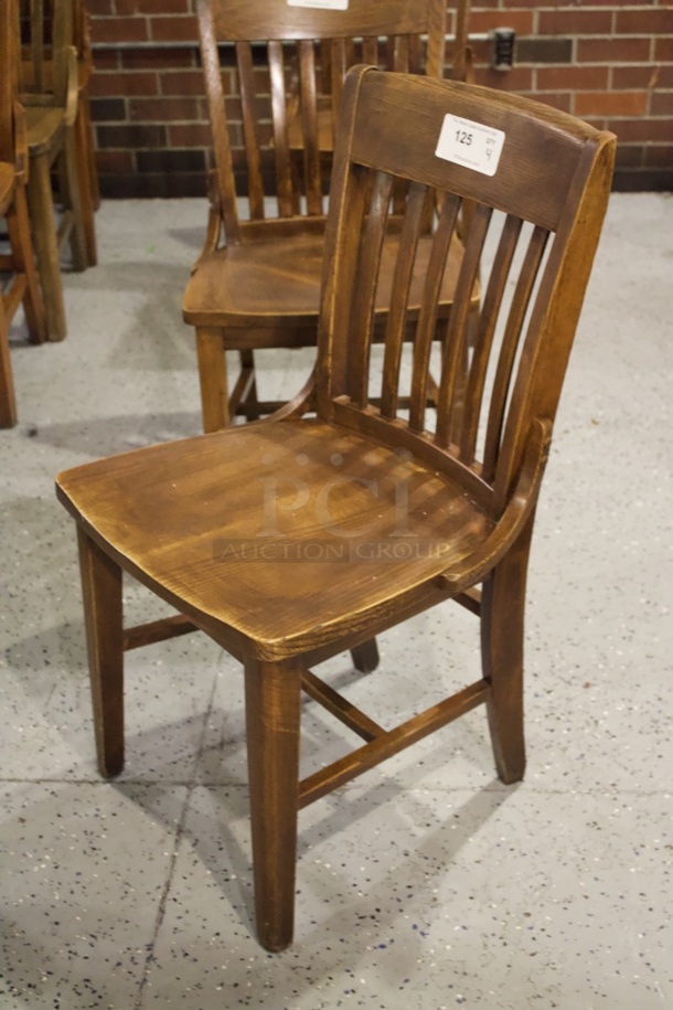 BEAUTIFUL! Set Of 4 Solid Wood Vertical Ladder Back Chairs. 18x13x35  
4x Your Bid.                      
some chairs are darker than others. - Image 3 of 4