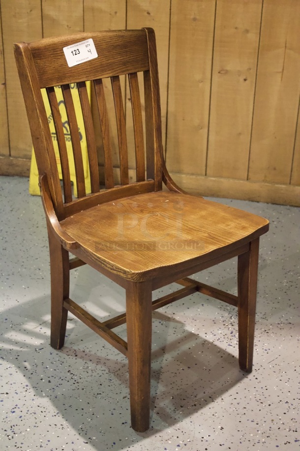 BEAUTIFUL! Set Of 4 Solid Wood Vertical Ladder Back Chairs. 18x13x35  
4x Your Bid.                      
some chairs are darker than others. - Image 3 of 4