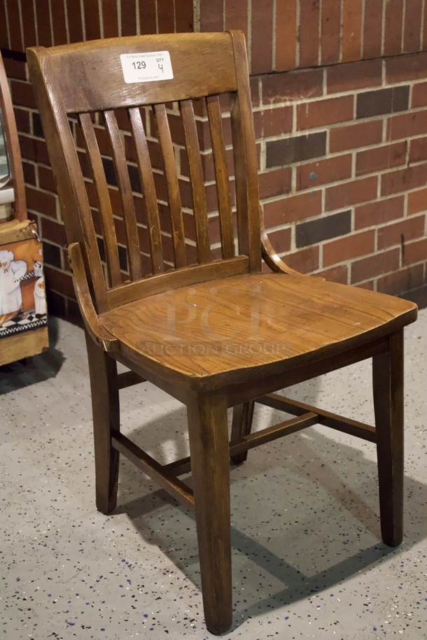 BEAUTIFUL! Set Of 4 Solid Wood Vertical Ladder Back Chairs. 18x13x35  
4x Your Bid.                      
some chairs are darker than others. - Image 2 of 6