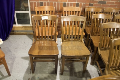 SOLID CRAFTSMANSHIP! Set Of 4 Wooden Ladder Back Chairs. 
18x13x35
some chairs are darker than others. 