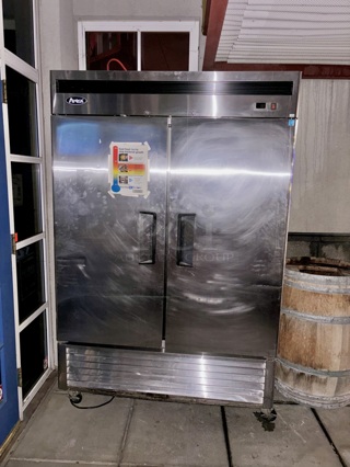 ATOSA BOTTOM MOUNT TWO DOOR REACH-IN REFRIGERATOR. On Commercial Casters.