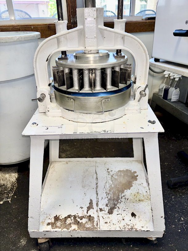 Oliver Dough Divider Deluxe, Model 623-ND, Allows for De-Gassing, Pressing and Dividing dough. Equipped With 18 Part Round Interchangeable Dividing Head & Pan On Stand With Locking Commercial Casters...Divider Can be detached and used with out stand.  - Image 3 of 6