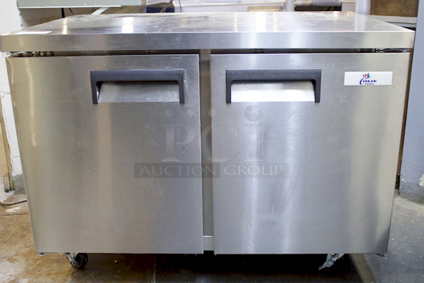LIKE NEW! Cooler Depot UUC 48R-E-HC Solid 2-Door Under Counter Refrigerator On Commercial Casters With PVC Coated Shelf. Tested In Perfect Working Order. 
 - Image 2 of 8