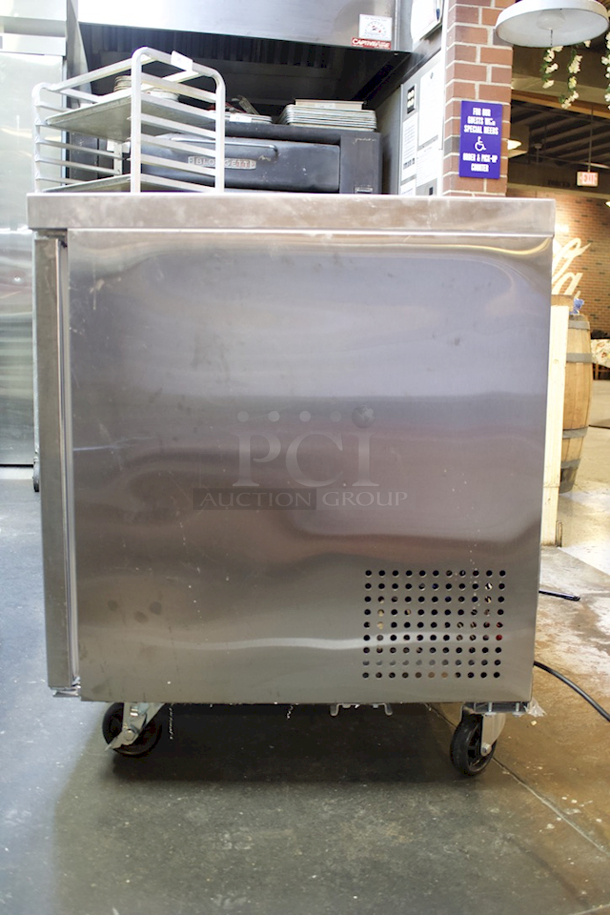 LIKE NEW! Cooler Depot UUC 48R-E-HC Solid 2-Door Under Counter Refrigerator On Commercial Casters With PVC Coated Shelf. Tested In Perfect Working Order. 
 - Image 8 of 8