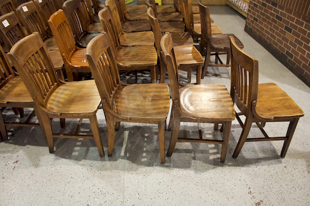BEAUTIFUL! Set Of 4 Solid Wood Vertical Ladder Back Chairs. 18x13x35  
4x Your Bid.                      
some chairs are darker than others. - Image 2 of 2