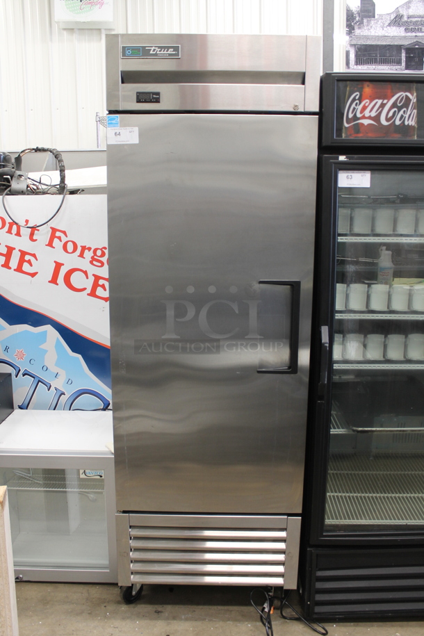 LATE MODEL! True ENERGY STAR Stainless Steel Commercial Single Door Reach In Cooler or Freezer w/ Poly Coated Racks on Commercial Casters. 115 Volts, 1 Phase. Tested and Powers On But Does Not Get Cold  - Image 1 of 6