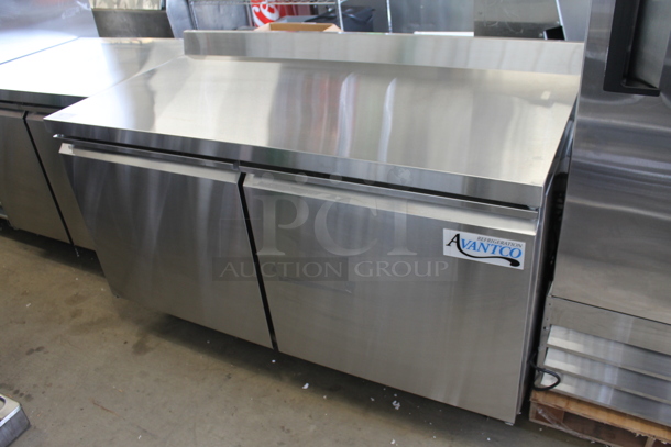 BRAND NEW SCRATCH AND DENT! 2023 Avantco 178SSWT60RHC Stainless Steel Commercial 2 Door Work Top Cooler w/ Back Splash on Commercial Casters. 115 Volts, 1 Phase.  Tested and Working! - Image 2 of 5
