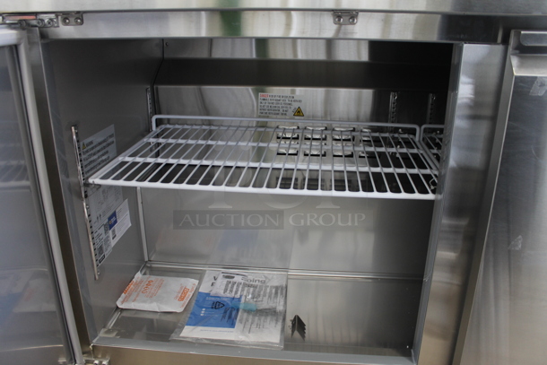BRAND NEW SCRATCH AND DENT! 2023 Avantco 178SSWT60RHC Stainless Steel Commercial 2 Door Work Top Cooler w/ Back Splash on Commercial Casters. 115 Volts, 1 Phase.  Tested and Working! - Image 3 of 5