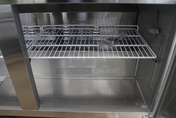 BRAND NEW SCRATCH AND DENT! 2023 Avantco 178SSWT60RHC Stainless Steel Commercial 2 Door Work Top Cooler w/ Back Splash on Commercial Casters. 115 Volts, 1 Phase.  Tested and Working! - Image 4 of 5