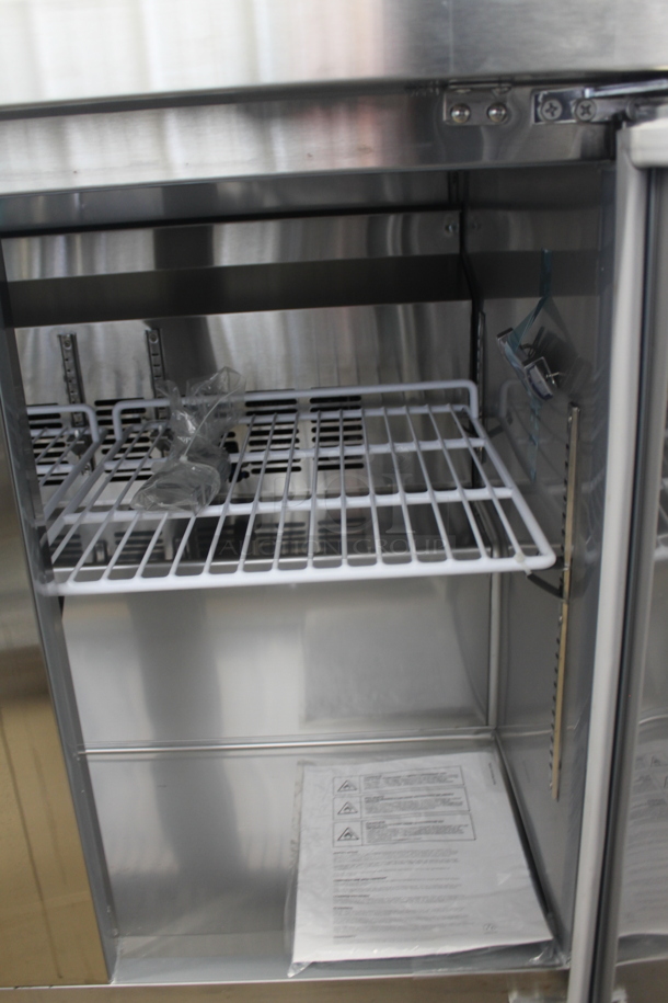 BRAND NEW SCRATCH AND DENT! 2023 Avantco 178SSUC36RHC Stainless Steel Commercial 2 Door Work Top Cooler on Commercial Casters. 115 Volts, 1 Phase.  Tested and Working! - Image 3 of 5