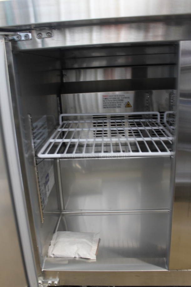 BRAND NEW SCRATCH AND DENT! 2023 Avantco 178SSUC36RHC Stainless Steel Commercial 2 Door Work Top Cooler on Commercial Casters. 115 Volts, 1 Phase.  Tested and Working! - Image 4 of 5