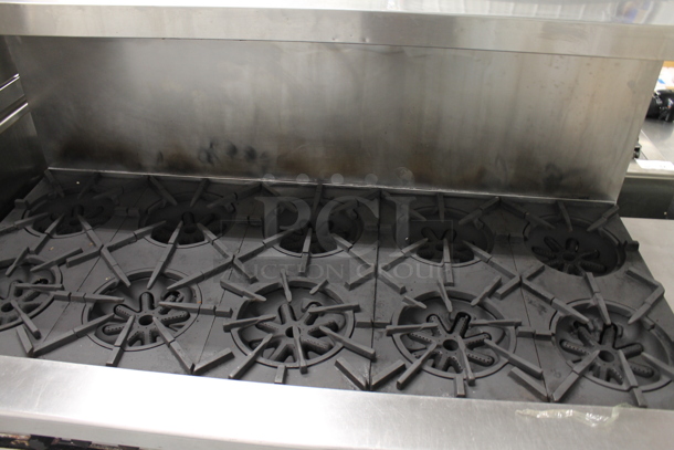 Garland Stainless Steel Commercial Natural Gas Powered 10 Burner Range w/ 2 Ovens, Over Shelf and Back Splash.  - Image 2 of 5
