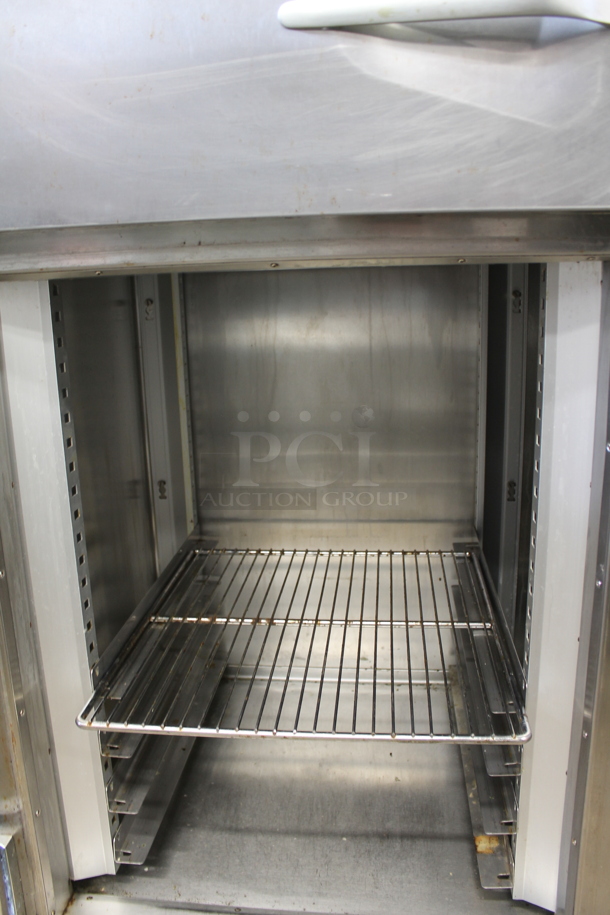 Traulsen Stainless Steel Commercial 4 Half Size Door Reach In Cooler w/ Metal Racks. Tested and Powers On But Does Not Get Cold - Image 5 of 6