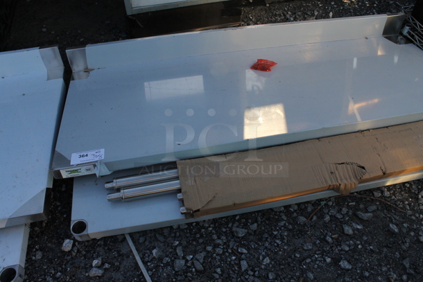 BRAND NEW SCRATCH AND DENT! Regency 600TSB2460S 24" x 60" 16-Gauge Stainless Steel Commercial Work Table with 4" Backsplash and Undershelf - Image 4 of 5