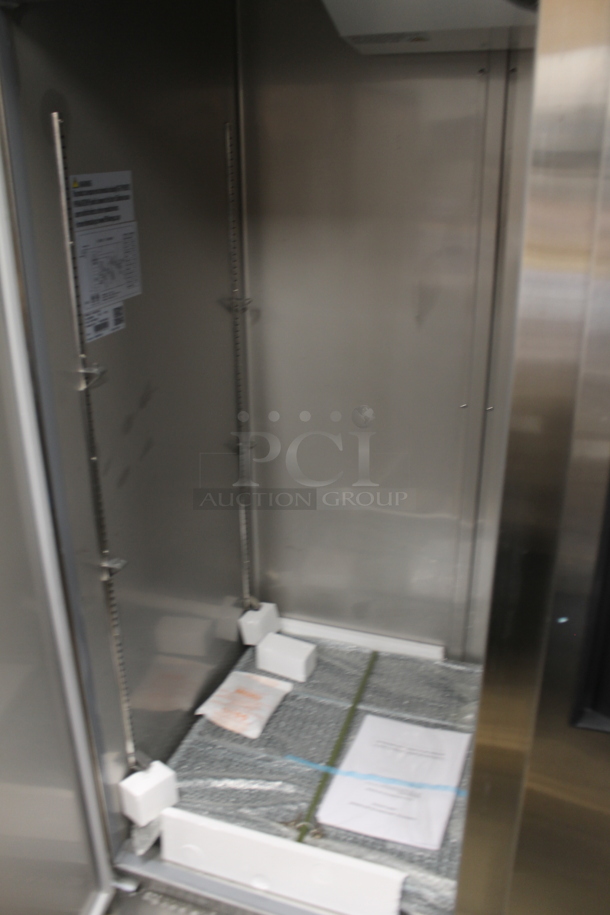 BRAND NEW SCRATCH AND DENT! 2023 KoolMore RIF-2D-SS Stainless Steel Commercial 2 Door Reach In Freezer w/ Poly Coated Racks on Commercial Casters. 115 Volts, 1 Phase. Tested and Working! - Image 6 of 8