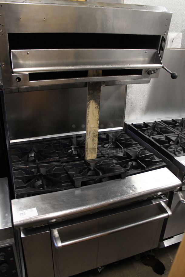 Stainless Steel Commercial Natural Gas Powered 6 Burner Range w/ Salamander Cheese Melter and Oven.  - Image 1 of 6