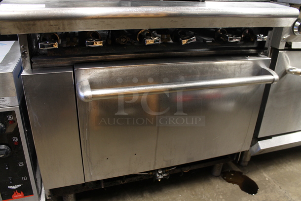 Stainless Steel Commercial Natural Gas Powered 6 Burner Range w/ Salamander Cheese Melter and Oven.  - Image 4 of 6