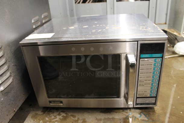Sharp R-22GT-F Stainless Steel Commercial Microwave Oven. 120 Volts, 1 Phase.  - Image 1 of 5