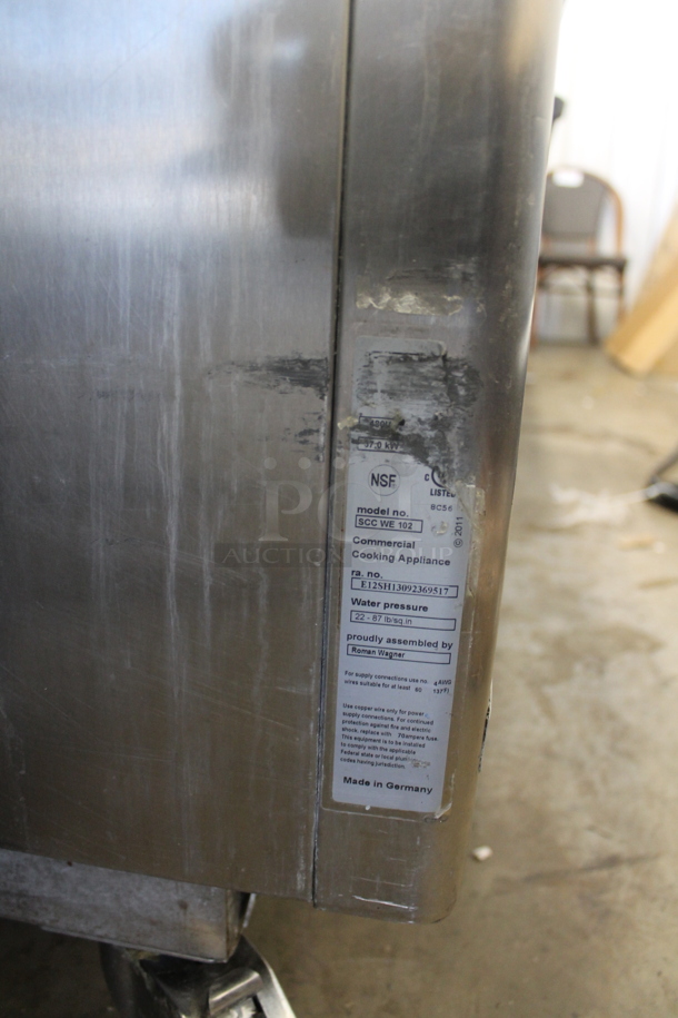 2 2013 Rational Stainless Steel Commercial Combitherm Self Cooking Center Convection Ovens on Commercial Casters. Top Model: SCC WE 62. Bottom Model: SCC WE 102. 480 Volts, 3 Phase. 2 Times Your Bid!
 - Image 8 of 8