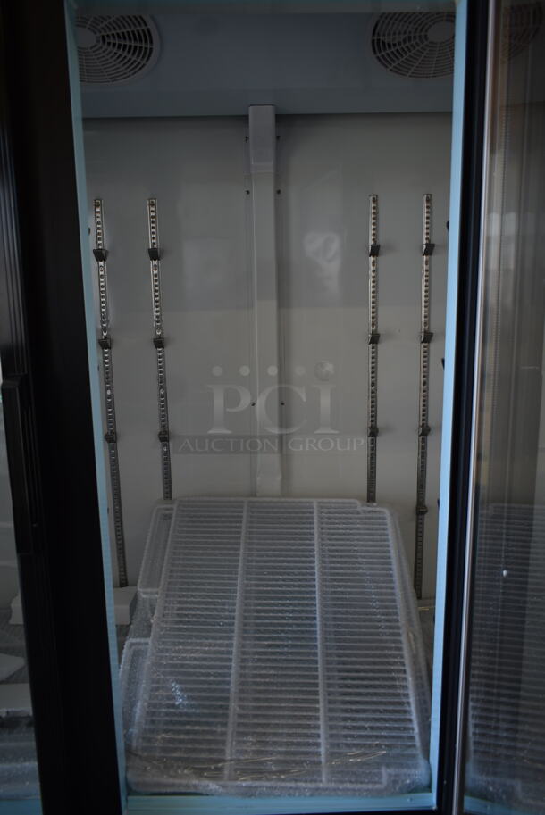 BRAND NEW SCRATCH AND DENT! 2023 Avantco 178GDC69HCB Metal Black 3 Door Reach In Cooler Swing Glass Door Merchandiser Refrigerator with LED Lighting and Poly Coated Racks. 115 Volts, 1 Phase.  Tested and Working! - Image 8 of 9