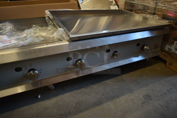 BRAND NEW SCRATCH AND DENT! Cooking Performance Group CPG 351GTCPG72NL Stainless Steel Commercial Countertop Natural Gas Powered Flat Top Griddle. 180,000 BTU. - Image 5 of 9